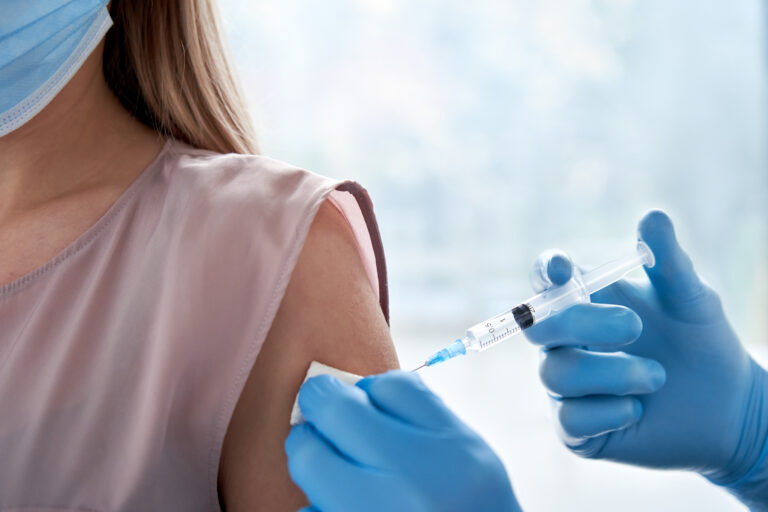 woman receiving a vaccine